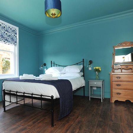 Beechurst Serviced Apartments เชลเทนแฮม ภายนอก รูปภาพ