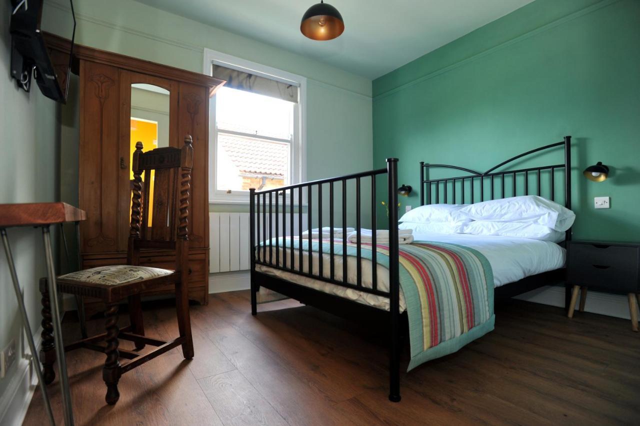 Beechurst Serviced Apartments เชลเทนแฮม ภายนอก รูปภาพ