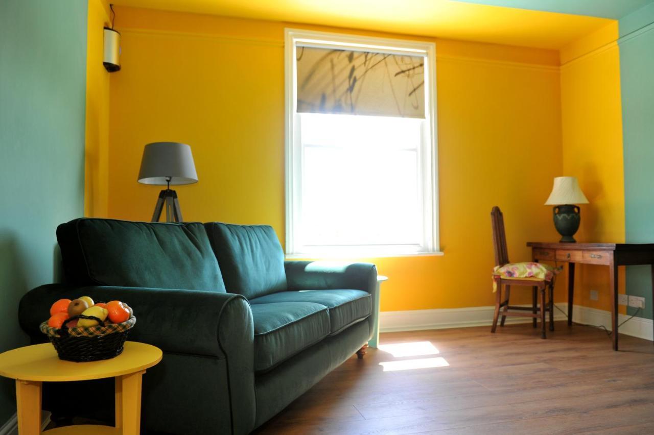 Beechurst Serviced Apartments เชลเทนแฮม ภายนอก รูปภาพ