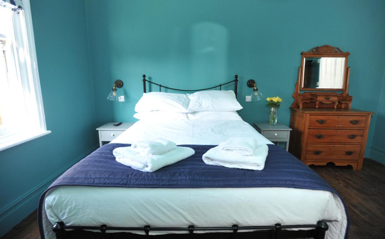 Beechurst Serviced Apartments เชลเทนแฮม ภายนอก รูปภาพ